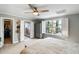 Main bedroom with a walk-in closet, ensuite bathroom, and large window at 1033 Mathis Ferry Rd, Mount Pleasant, SC 29464