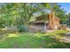 Large backyard with a brick house and a chainlink fence at 105 Greendale Ct, Summerville, SC 29485