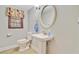Cozy bathroom featuring a pedestal sink, classic fixtures, and neutral decor at 105 Greendale Ct, Summerville, SC 29485