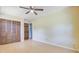 Bright bedroom with light-colored wood floors, neutral walls, ceiling fan, and closet at 105 Greendale Ct, Summerville, SC 29485