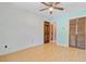 Bedroom with hardwood floors, a ceiling fan, and a closet with a vintage-style door at 105 Greendale Ct, Summerville, SC 29485