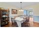 Charming dining room featuring hardwood floors, traditional decor, and ample seating at 105 Greendale Ct, Summerville, SC 29485