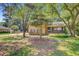 Traditional brick home with a cozy front porch and mature trees at 105 Greendale Ct, Summerville, SC 29485