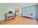 Cozy living room with a piano, comfortable seating, and hardwood floors at 105 Greendale Ct, Summerville, SC 29485