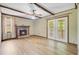 Spacious living room features a brick fireplace and access to an outdoor patio at 105 Greendale Ct, Summerville, SC 29485