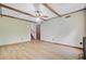 Expansive living room showcasing wood beams, neutral tones, and access to stairs at 105 Greendale Ct, Summerville, SC 29485