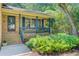 Inviting front porch with blue railings, perfect for relaxing and enjoying the view at 105 Greendale Ct, Summerville, SC 29485