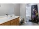 Well lit bathroom featuring a single sink vanity and shower/tub with decorative shower curtain at 106 Maypop Dr, Goose Creek, SC 29445