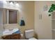 Well-lit bathroom featuring vanity, mirror, and decorative towel arrangement at 106 Sioux Ct, Summerville, SC 29483