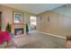 Bright living room with a cozy fireplace, plush carpet, and an open layout at 106 Sioux Ct, Summerville, SC 29483