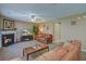 Large living room featuring a fireplace, plenty of seating, and a large area rug at 106 Sioux Ct, Summerville, SC 29483