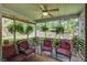 Relaxing screened porch with comfortable seating and views of the spacious backyard at 106 Sioux Ct, Summerville, SC 29483