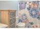 Bathroom showcasing a decorative cabinet and floral shower curtain at 110 Clubhouse Rd, Summerville, SC 29483