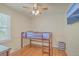 Bedroom with hardwood floors, a window, and a loft bed perfect for children at 110 Clubhouse Rd, Summerville, SC 29483