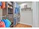 Walk-in closet with custom shelving, drawers, and ample storage space at 110 Clubhouse Rd, Summerville, SC 29483