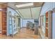Home office with hardwood floors, desk, shelves and natural light at 110 Clubhouse Rd, Summerville, SC 29483