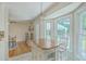 Updated kitchen featuring an island with seating, a light fixture, and sun-filled bay window at 110 Clubhouse Rd, Summerville, SC 29483