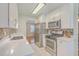 Updated kitchen featuring stainless steel appliances and a stylish backsplash at 110 Clubhouse Rd, Summerville, SC 29483