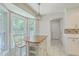 Eat-in kitchen features lots of sunlight and custom cabinets at 110 Clubhouse Rd, Summerville, SC 29483