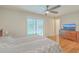 Main bedroom with hardwood floors, large sliding glass door, and an en-suite bathroom at 110 Clubhouse Rd, Summerville, SC 29483
