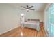 Main bedroom featuring hardwood floors, and sliding glass doors to the backyard at 110 Clubhouse Rd, Summerville, SC 29483
