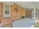 Covered patio with brick accents leading to the backyard at 110 Clubhouse Rd, Summerville, SC 29483