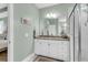 Bright bathroom with double sink vanity, granite counters and walk-in shower at 1115 Old Field Dr, Summerville, SC 29483