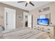 Bedroom featuring a beach-themed TV on a white dresser and muted walls at 1115 Old Field Dr, Summerville, SC 29483