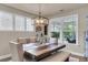 Elegant dining room featuring a stylish table, comfortable seating, and modern lighting at 1115 Old Field Dr, Summerville, SC 29483
