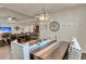 Open-concept dining area with stylish furnishings, pendant lighting, and seamless access to kitchen at 1115 Old Field Dr, Summerville, SC 29483