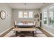Charming dining area featuring modern decor, ample natural light, and comfortable seating at 1115 Old Field Dr, Summerville, SC 29483
