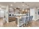 Well-appointed kitchen with a center island, pendant lighting, stainless steel appliances, and bar stool seating at 1115 Old Field Dr, Summerville, SC 29483