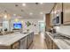 Beautiful kitchen showcasing granite countertops, stainless steel appliances, and modern pendant lighting at 1115 Old Field Dr, Summerville, SC 29483