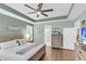 Lovely main bedroom features hardwood floors, a trey ceiling and ensuite bathroom at 1115 Old Field Dr, Summerville, SC 29483