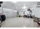 Spacious garage featuring epoxy floors and overhead storage system at 1136 Kane Blue, Summerville, SC 29485