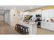 Bright kitchen featuring stainless steel appliances and a quartz island with seating at 1136 Kane Blue, Summerville, SC 29485