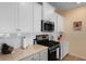 Well-lit kitchen with stainless steel appliances and white subway tile backsplash at 1136 Kane Blue, Summerville, SC 29485