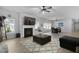 Spacious living room with fireplace flowing into the dining area, perfect for entertaining and Gathering gatherings at 1136 Kane Blue, Summerville, SC 29485