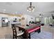 Open-concept layout: kitchen with island, dining area, and living room blend seamlessly at 1136 Kane Blue, Summerville, SC 29485