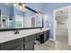 Bathroom with a large mirror over the double sink vanity and tile floors at 114 Marshside Dr, Summerville, SC 29485