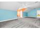 Large bedroom with a ceiling fan, carpet flooring, and a unique orange accent wall at 114 Marshside Dr, Summerville, SC 29485