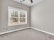 Cozy bedroom with carpet flooring, one window, and neutral paint at 114 Marshside Dr, Summerville, SC 29485