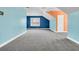 Large bedroom featuring blue and orange accent walls, a ceiling fan and carpet floors at 114 Marshside Dr, Summerville, SC 29485