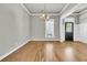 Dining room features hardwood floors, crown molding, chair rail and a modern chandelier at 114 Marshside Dr, Summerville, SC 29485