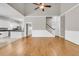 Hardwood floors throughout open living space, with views into the kitchen and stairs at 114 Marshside Dr, Summerville, SC 29485