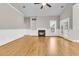 Spacious living room featuring hardwood floors, a fireplace, and ample natural light at 114 Marshside Dr, Summerville, SC 29485