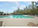 Resort-style pool with pergola seating and lounge chairs for residents enjoyment and relaxation at 114 Marshside Dr, Summerville, SC 29485