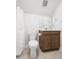 Bathroom with toilet, vanity and shower with neutral tones at 1150 Oak Bluff Ave, Charleston, SC 29492