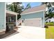 Two car garage with staircase and screened in porch and driveway for additional parking at 1150 Oak Bluff Ave, Charleston, SC 29492