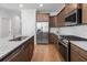Elegant kitchen with stainless steel appliances, granite countertops, and a kitchen island at 1150 Oak Bluff Ave, Charleston, SC 29492